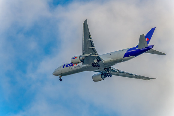 N863FD FedEx Express Boeing 777-FS2 flying in the afternoon sky