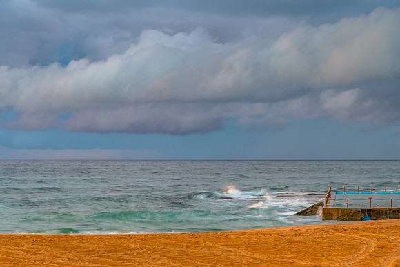 Sunrise at the Seaside with rain clouds