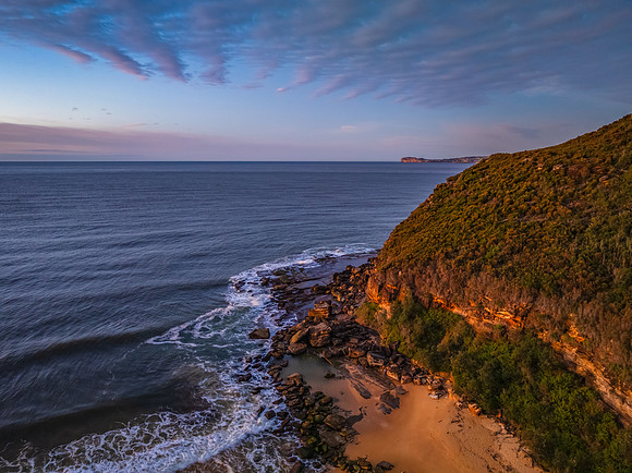Winter seascape views over the beach with high and medium cloud