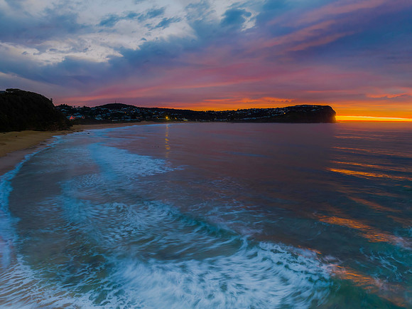 Cloud filled sunrise seascape