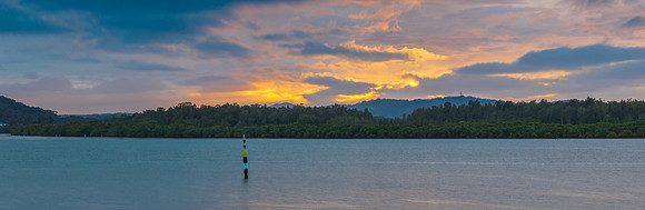 Stormy sunrise skies over the bay