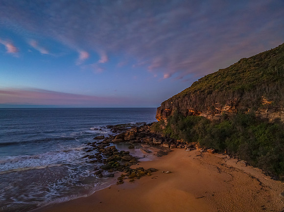 Winter seascape views over the beach with high and medium cloud
