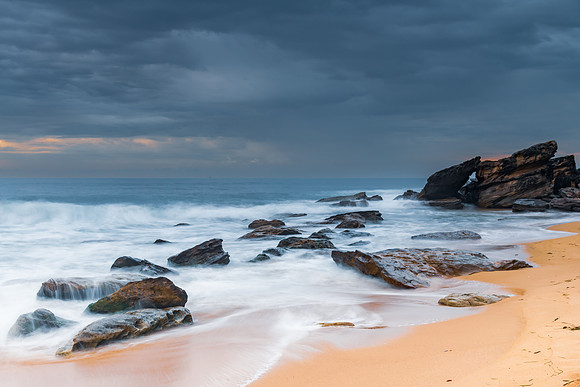 Sunrise at the seaside with rocks and beautiful diffused light