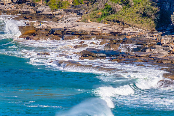 Waves washing on the rocks at Whale Beach