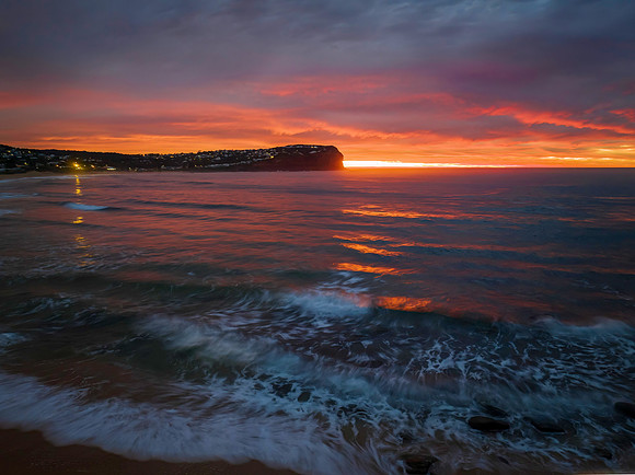Cloud filled sunrise seascape