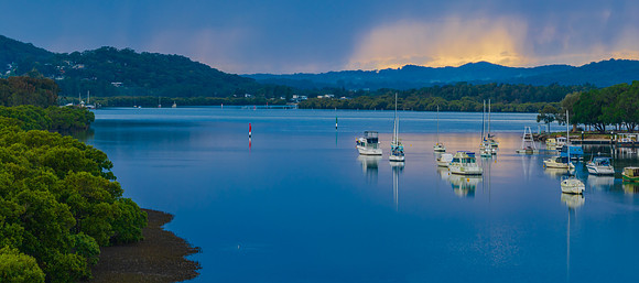 Early morning storm light and reflections at the waterfront