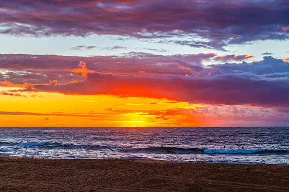 Sunrise at the Seaside with rain clouds