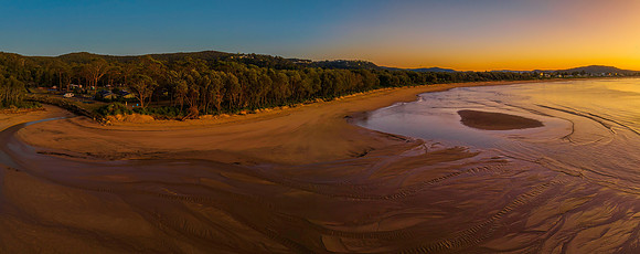 Aerial sunrise panorama at the beach on a cold Winter's morning