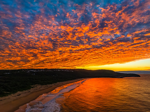 Winter seascape views over the beach with high and medium cloud