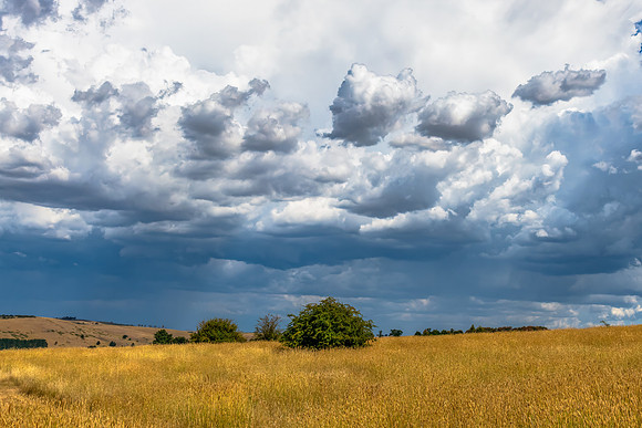 Afternoon storm clouds over the rural countryside