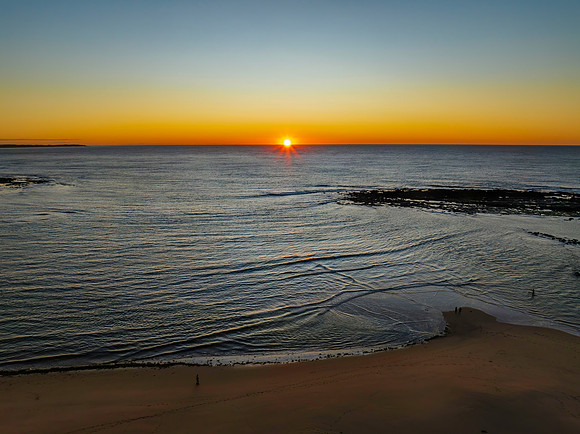 Aerial sunrise seascape with  clear skies