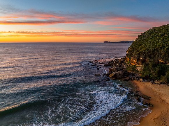 Sunrise at the seaside with high cloud