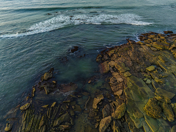 Aerial sunrise seascape with  clear skies
