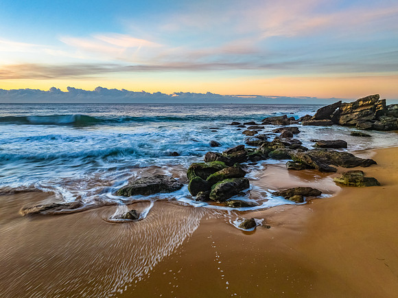 Sunrise seascape views with high cloud
