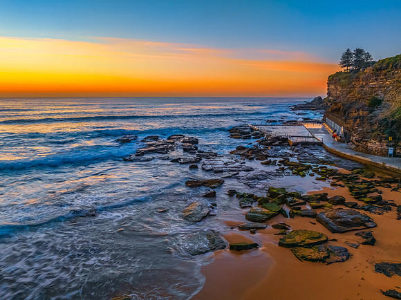 Sunrise at the Seaside with an Orange Horizon