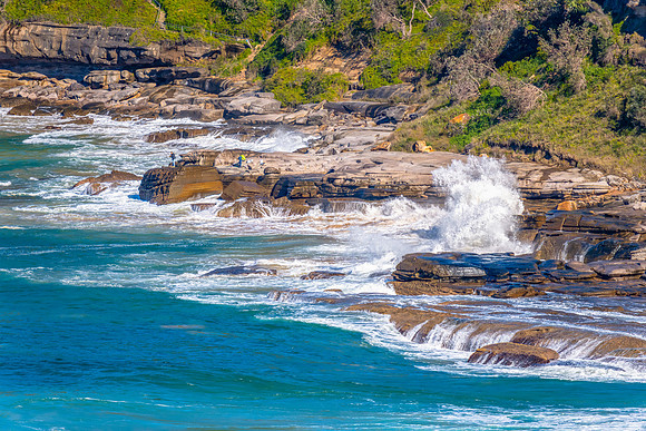 Waves washing on the rocks at Whale Beach