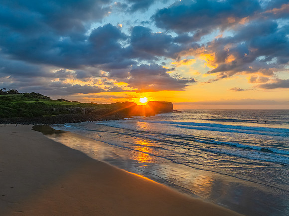 Aerial sunrise views over Bombo Beach at Kiama