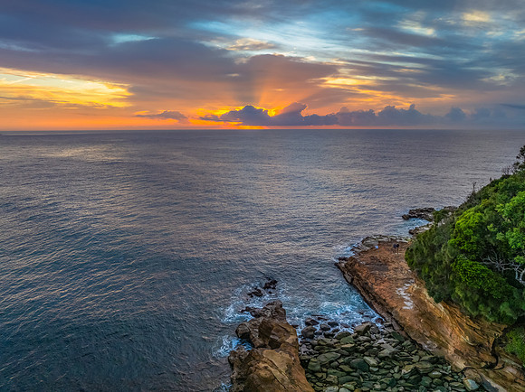 Aerial Sunrise Seascape Shrouded in Fog and High Clouds