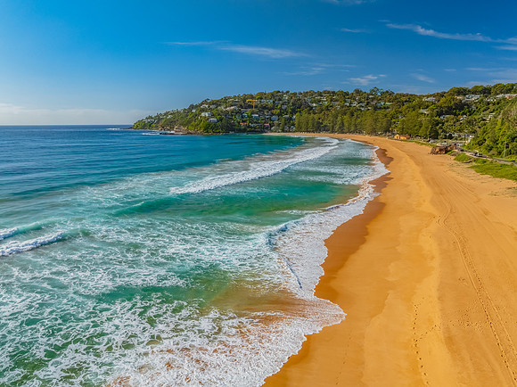 A Perfect Day by the Sea Under Clear Blue Skies