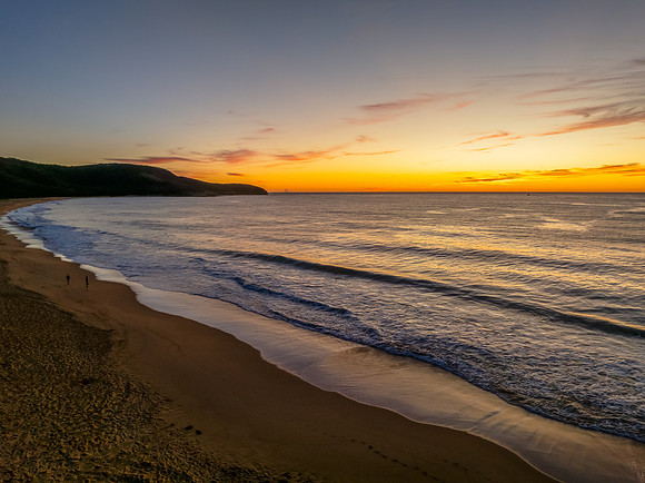 Sunrise at the seaside with high cloud