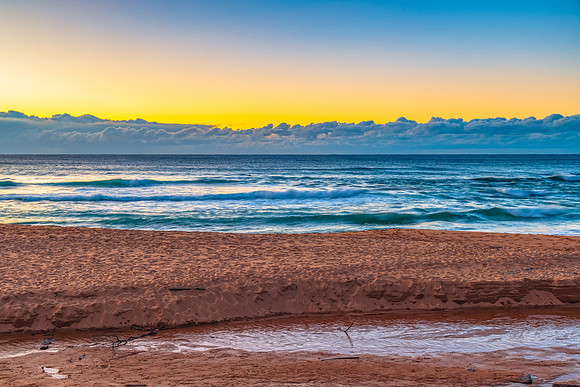 Sunrise by the sea shore