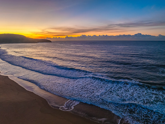Sunrise seascape views with high cloud