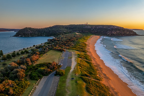Sunrise at the seaside with clear skies and orange horizon