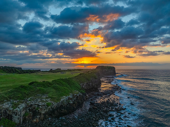 Aerial sunrise views over Bombo Beach at Kiama