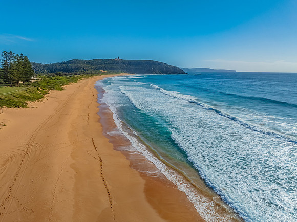 A Perfect Day by the Sea Under Clear Blue Skies