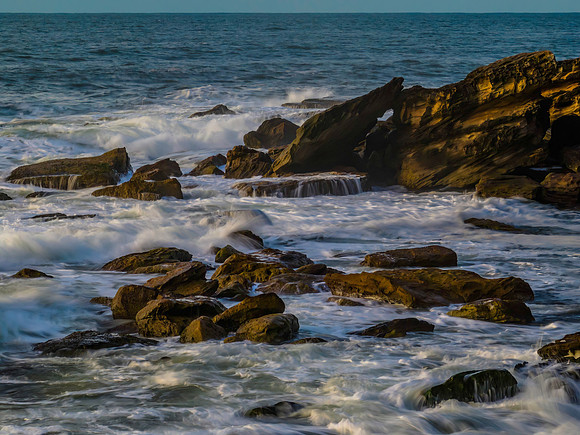 Sea and rocks in the sunrise light