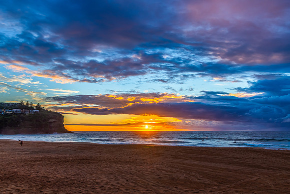 Sunrise at the Seaside with rain clouds