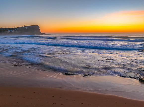 Sunrise at the Seaside with an Orange Horizon
