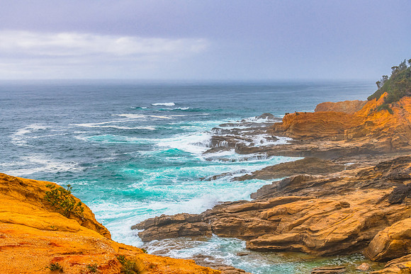 Overcast morning seascape with rocky headland at Bermagui
