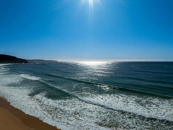 Beautiful day at the seaside with blue skies and sunlight