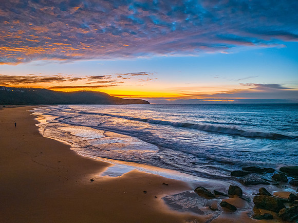 Winter seascape views over the beach with high and medium cloud