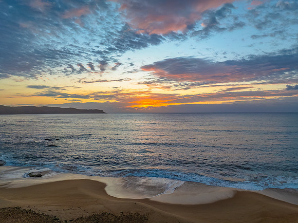 After the rain sunrise at the seaside