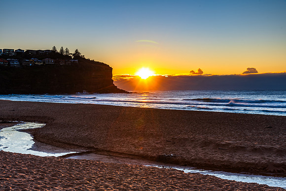 Sunrise by the sea shore