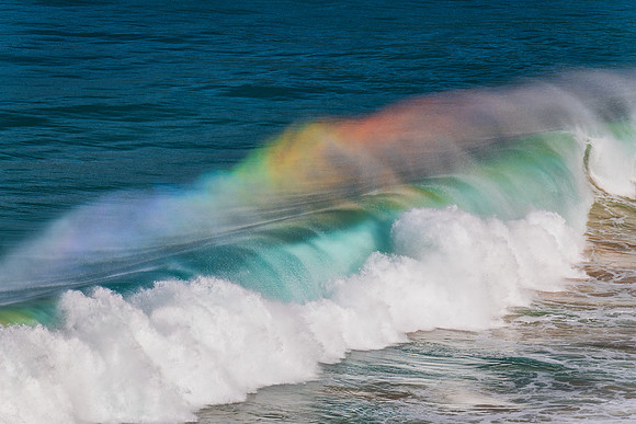 Rainbow light in the Waves at Whale Beach