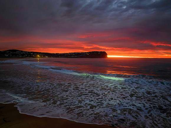 Cloud filled sunrise seascape