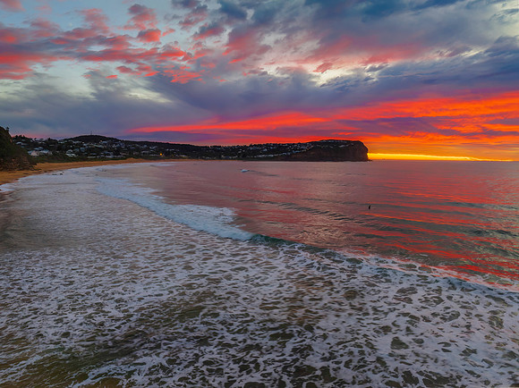 Cloud filled sunrise seascape