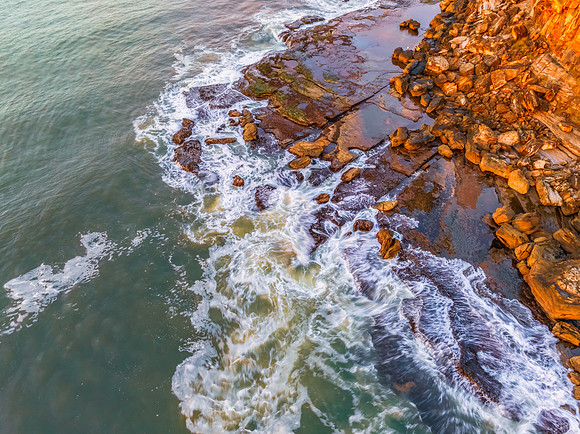 Winter seascape top down views over the rock platform