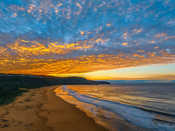 Winter seascape views over the beach with high and medium cloud
