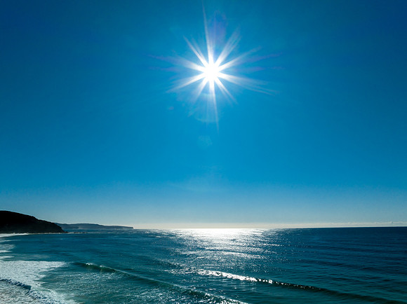 Beautiful day at the seaside with blue skies and sunlight