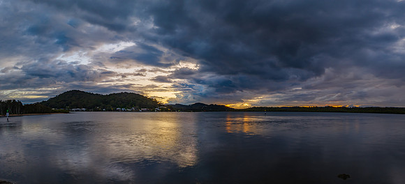 Stormy sunrise skies over the bay