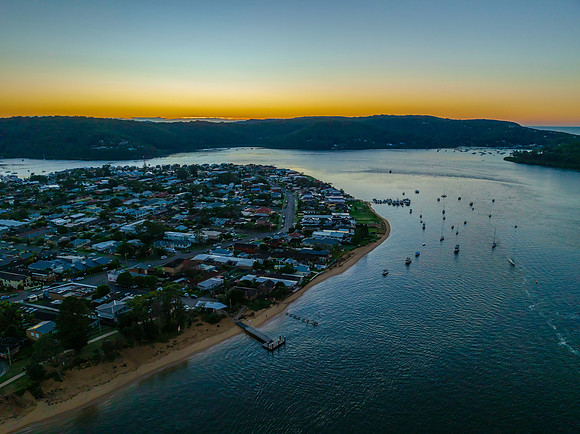 Aerial sunrise waterscape with clear skies