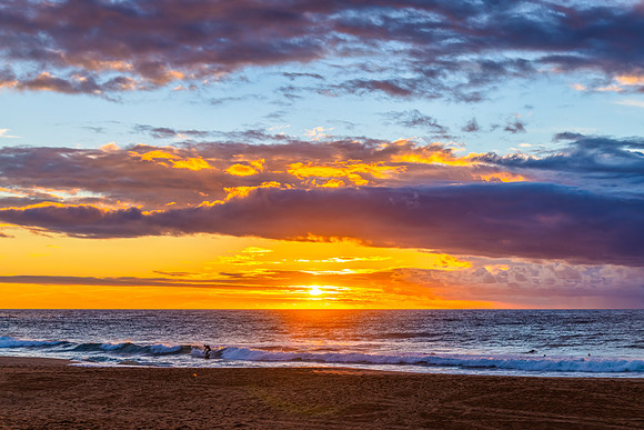Sunrise at the Seaside with rain clouds
