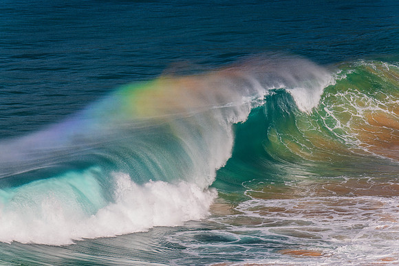 Rainbow light in the Waves at Whale Beach