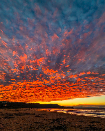 Winter seascape views over the beach with high and medium cloud