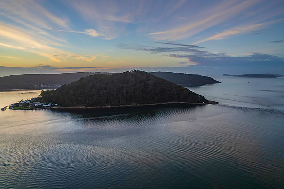 Aerial sunrise waterscape with boats