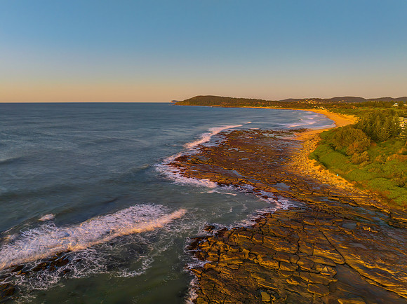 Aerial sunrise seascape with  clear skies